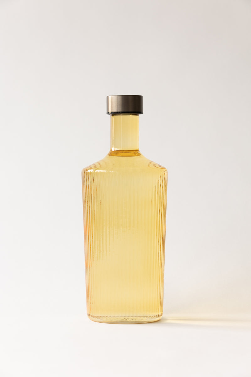 Gele-glazen-fles-met-draaidop-paveau verkocht door Anneke Crauwels Home